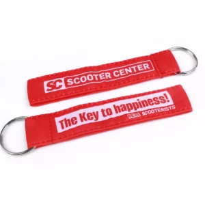 Avaimenperä Scooter Center Key to Happiness, punainen kaksi kappaletta, kaksi punaista avaimenperää